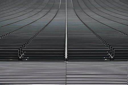 lined black benches and bleachers thumbnail