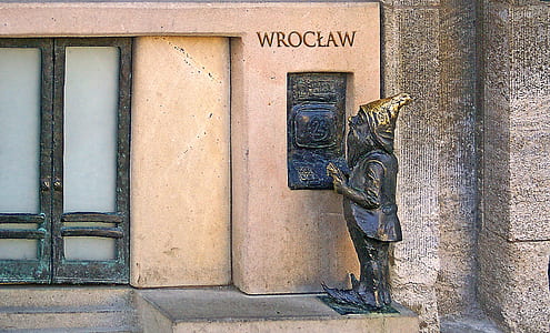 genome statue on pavement thumbnail
