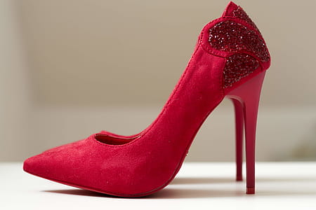 Red Suede Pointed-toe Stilettos on White Surface thumbnail