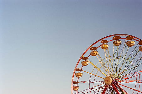 Red and Yellow Ferris Wheel Photo thumbnail