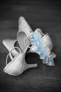 selective color photo of pair of floral kitten-heeled d'Orsay shoes thumbnail