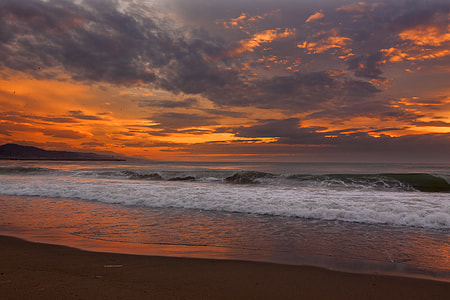sea wave during sunset thumbnail