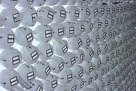 white flying lanterns low angle photography thumbnail