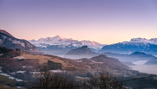 photo of mountain cover by snow during daytime thumbnail