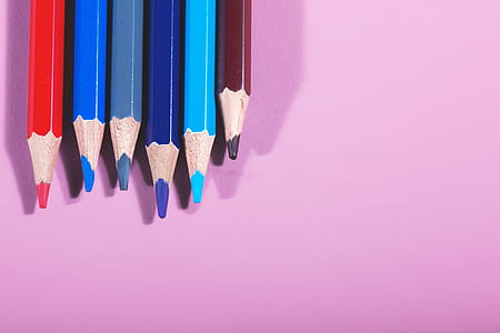 Colored Pencils On Pink Photo thumbnail