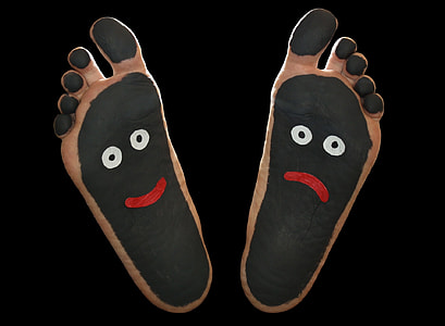 person's foot with happy and sad artworks thumbnail