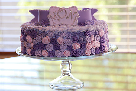 purple and pink floral Moni text print cake on clear glass cake stand thumbnail