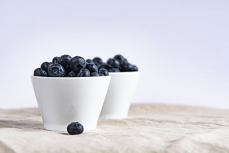 black berries in white ceramic bowl thumbnail