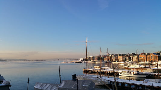 boats near buildings and body of water thumbnail