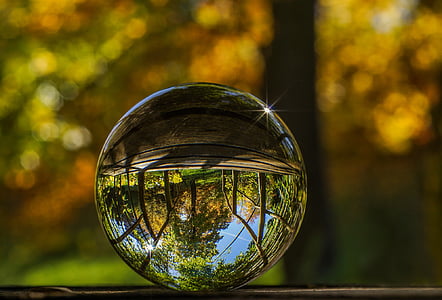 selective focus photo of clear glass paper weight thumbnail