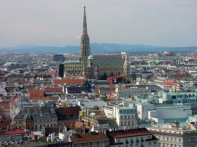 aerial photography of tower surrounded by building at daytime photo thumbnail