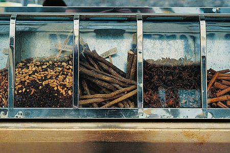 stainless steel framed container with nuts and star anise thumbnail