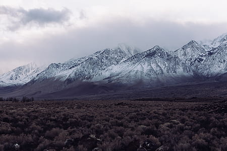 wide angle photo of snow-capped mountain thumbnail