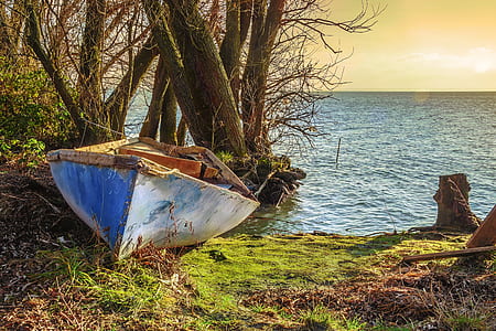 white and brown jon boat thumbnail