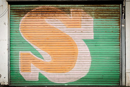 green and yellow roller shutter with S print thumbnail