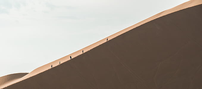 people walking on desert thumbnail