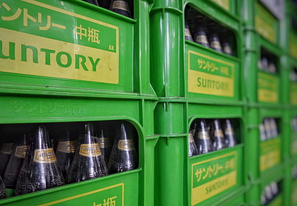 selective focus photography bottles in crate thumbnail