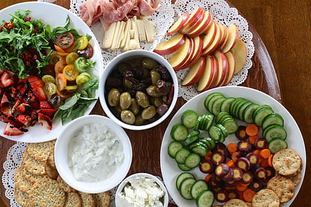 sliced assorted fruits and vegetables on the table thumbnail