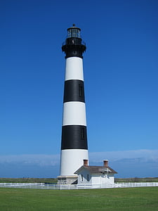 white and black lighthouse photography thumbnail