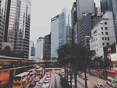 cars moving near building thumbnail
