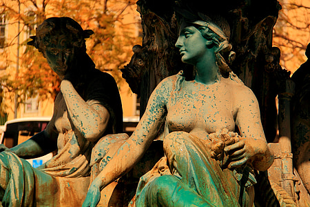 two women statues during daytime thumbnail