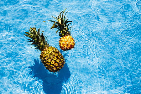 Pineapple in a swimming pool thumbnail