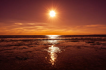 orange sunset in ocean thumbnail