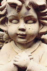 statue of brown child thumbnail