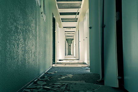 focus photo of gray concrete hallway thumbnail