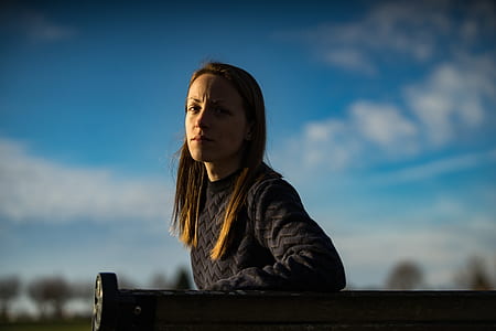 woman sitting on bench thumbnail