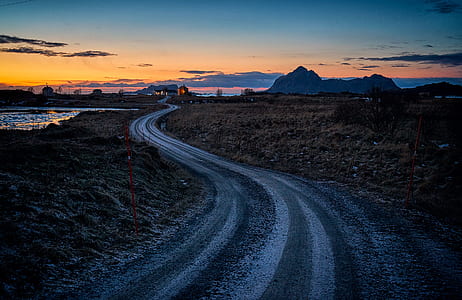empty gray and brown road during dawn thumbnail