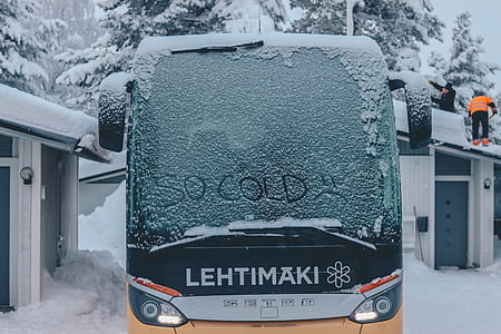 bus covered with snow thumbnail