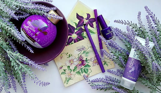 purple makeup kit and purple petaled flowers thumbnail
