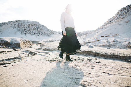 woman standing on snowy mountain thumbnail