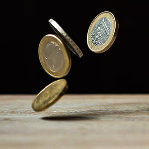 Coins on Brown Wood thumbnail