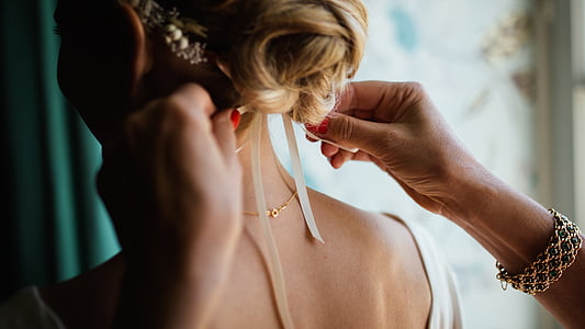 woman wearing white top thumbnail