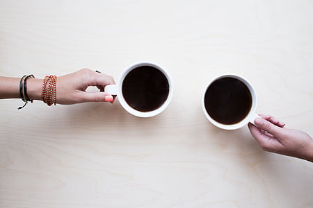 two white ceramic coffee cups thumbnail