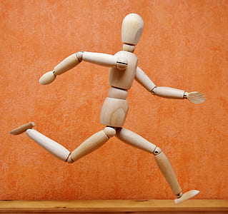 wooden robot action figure running action thumbnail