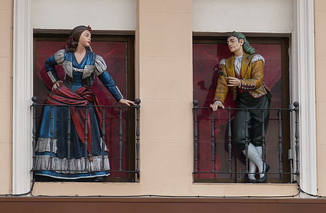 man and woman on terrace figurine thumbnail