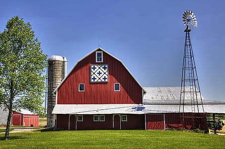 red barn near windmill thumbnail