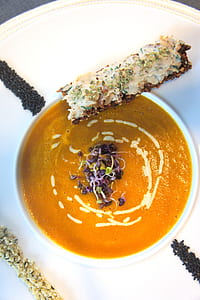 Pumpkin Soup on White Ceramic Bowl thumbnail