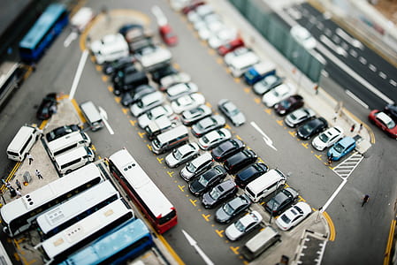 aerial photography of vehicles on parking lot thumbnail