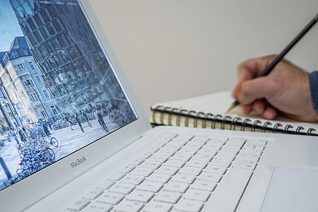 Man White MacBook thumbnail