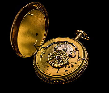 gold-colored pocket watch thumbnail