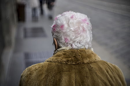 selective focus of person on gray pavement thumbnail