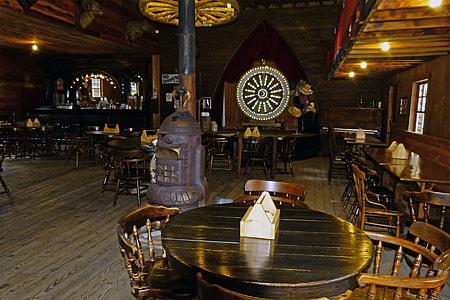 dining set beside a fireplace thumbnail