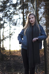 Woman in Blue Denim Jacket Standing thumbnail