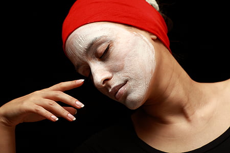 woman with face paint wearing red headband thumbnail