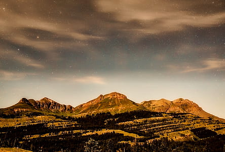 mountain under blue sky thumbnail