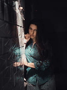 Selective Focus Photography of Woman Learning on Wall thumbnail